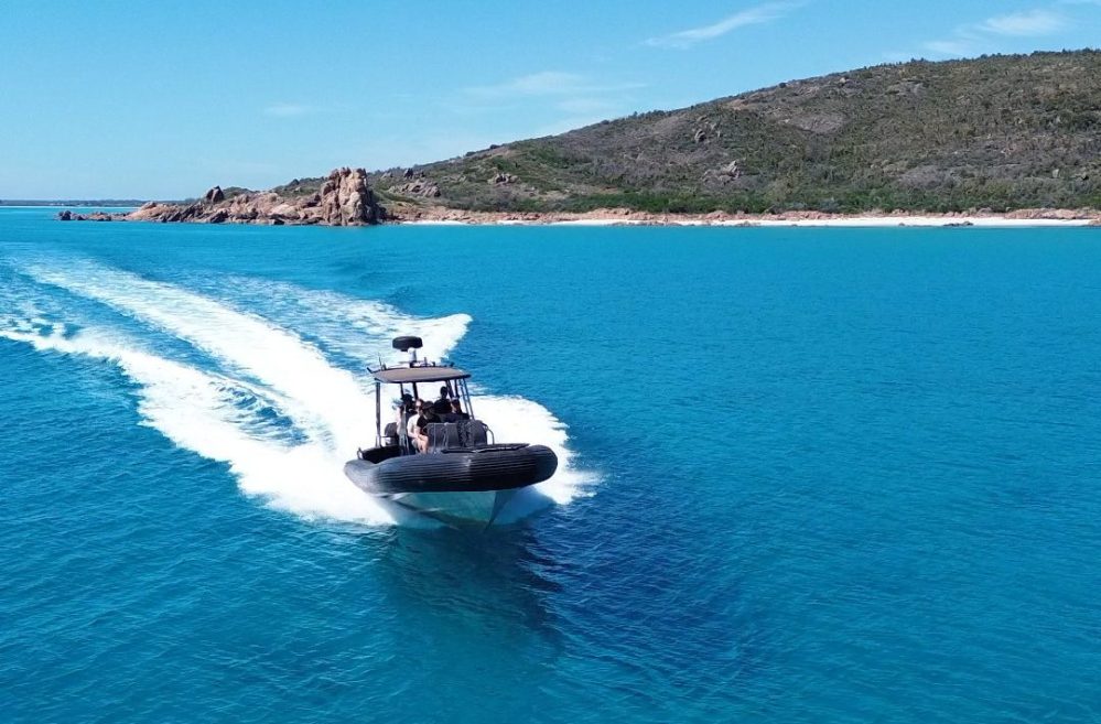 a small boat in a body of water