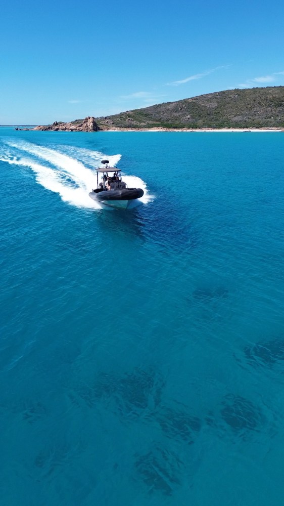 a small boat in a body of water
